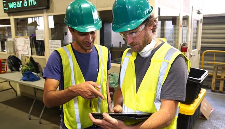 Two men working