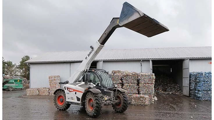 bobcat handler with bucket raised