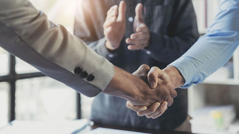 two people shaking hands