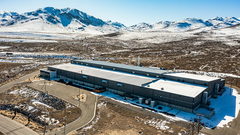 An aerial view of ABTC's new lithium-ion battery recycling facility located in the Tahoe-Reno Industrial Center in McCarran, Nevada. The facility is surrounded by mountains and vast open space.