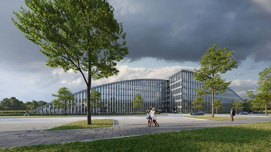 an aluminum clad building with a treelined path in front of it