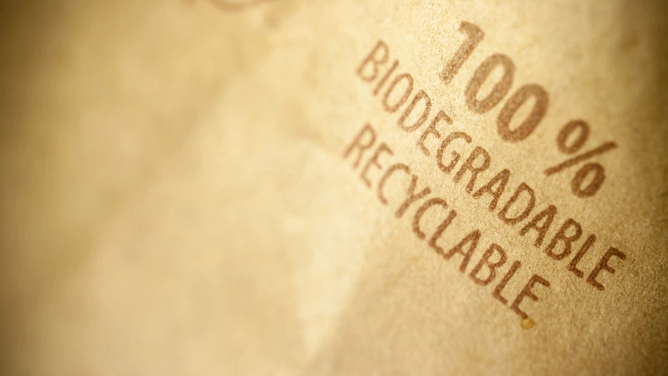 compostable packaging with "100% biodegradable recyclable" printed on it