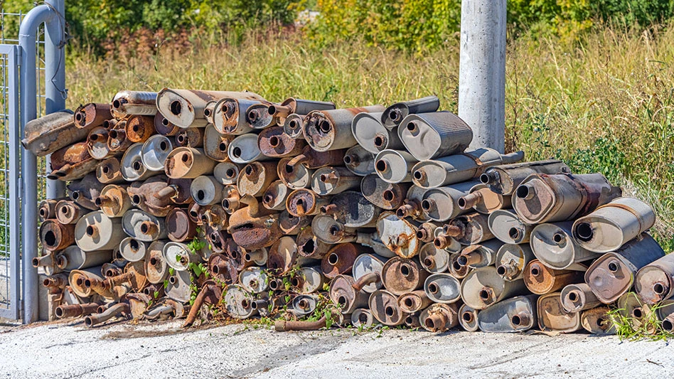 rusty catalytic converters pile up