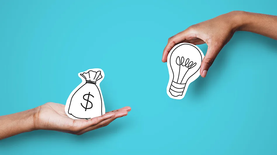 two hands against a blue background, one holds a paper drawing of money and the other holds a lightbulb