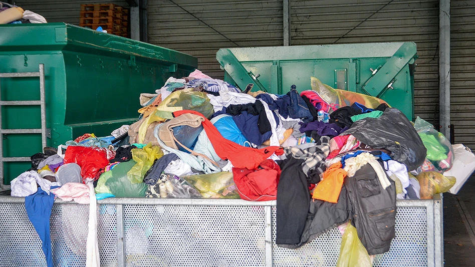 a industrial container full of clothing