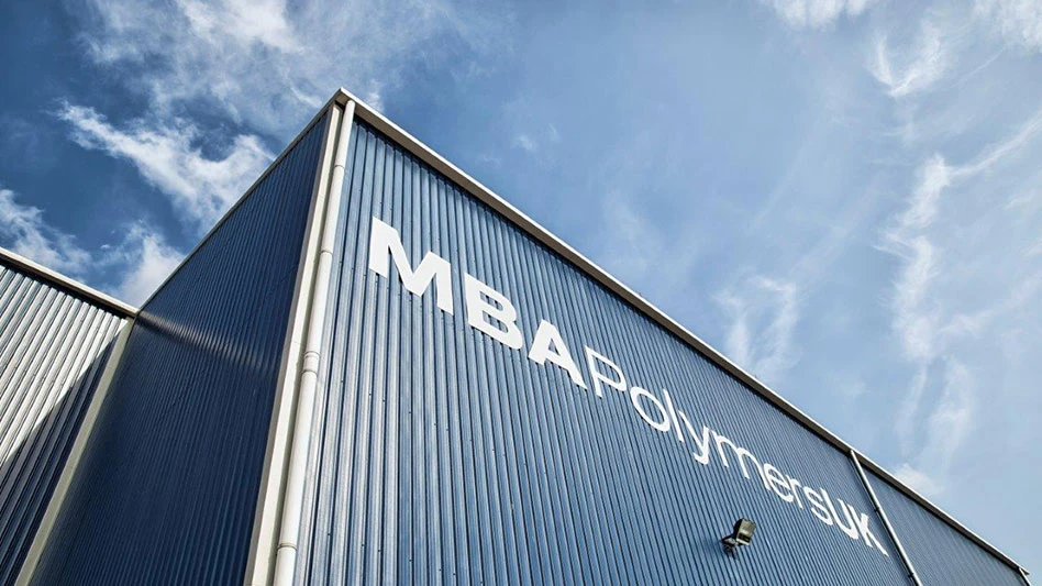 the top of a building with the MBA Polymers UK name on it