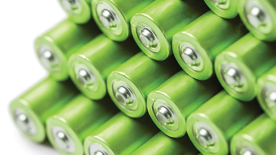 A stack of green batteries on a white background.