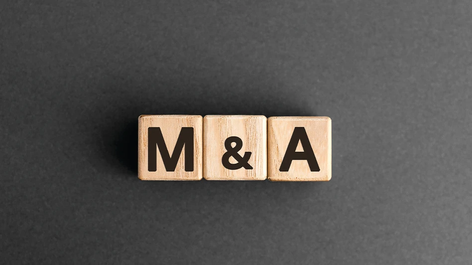 Wooden tiles that read "M & A" on a gray background.