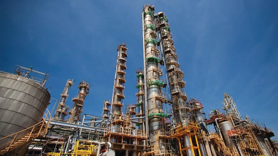 A braskem processing facility in South America under a clear, blue sky.