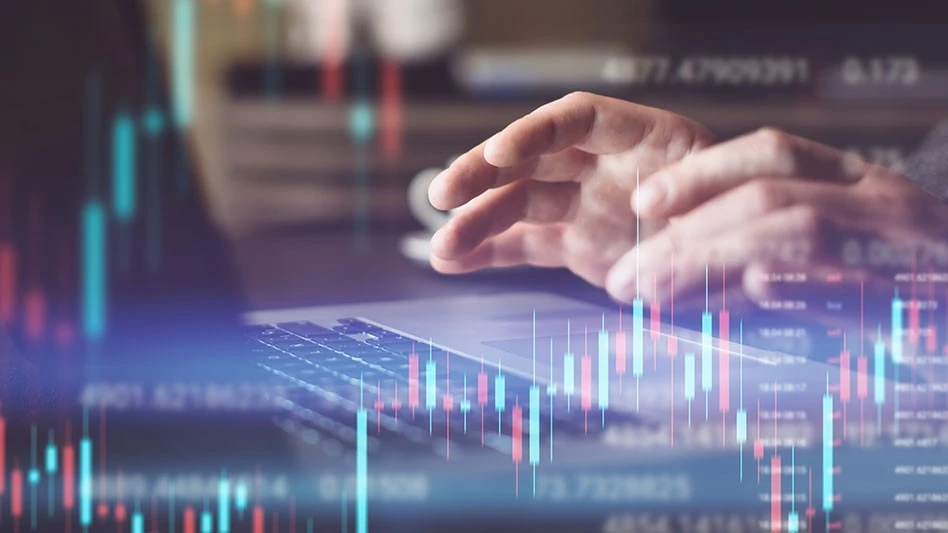 person typing on laptop with market info in the foreground