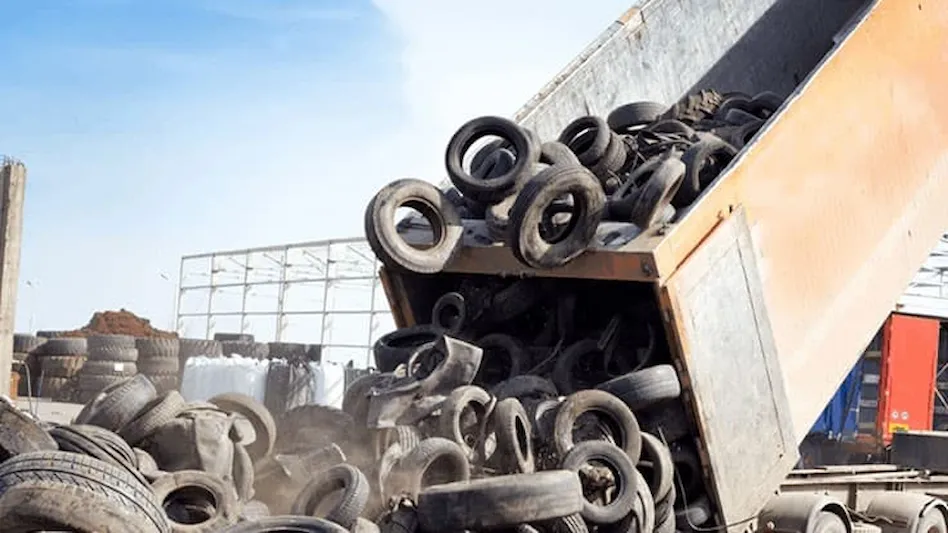 truck dumping scrap tires